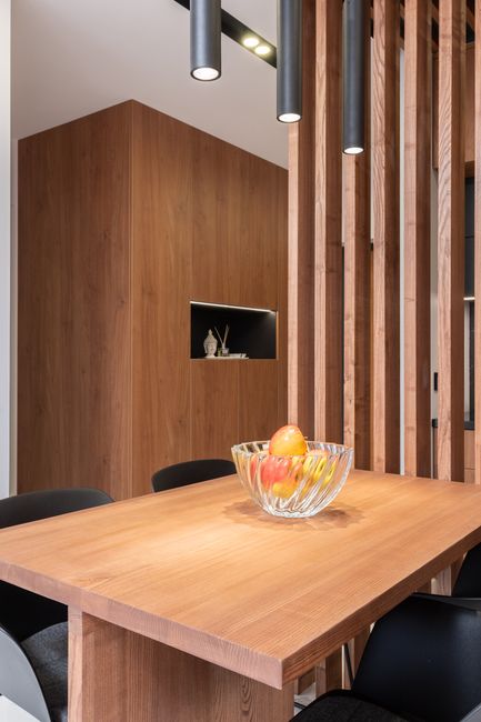 Walnut dining table in crafted dining room